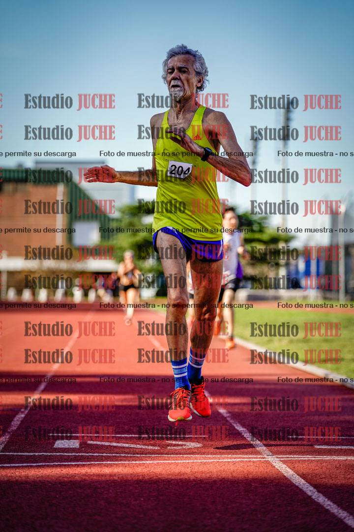Fotos de los 5000 m llanos de mujeres y varones