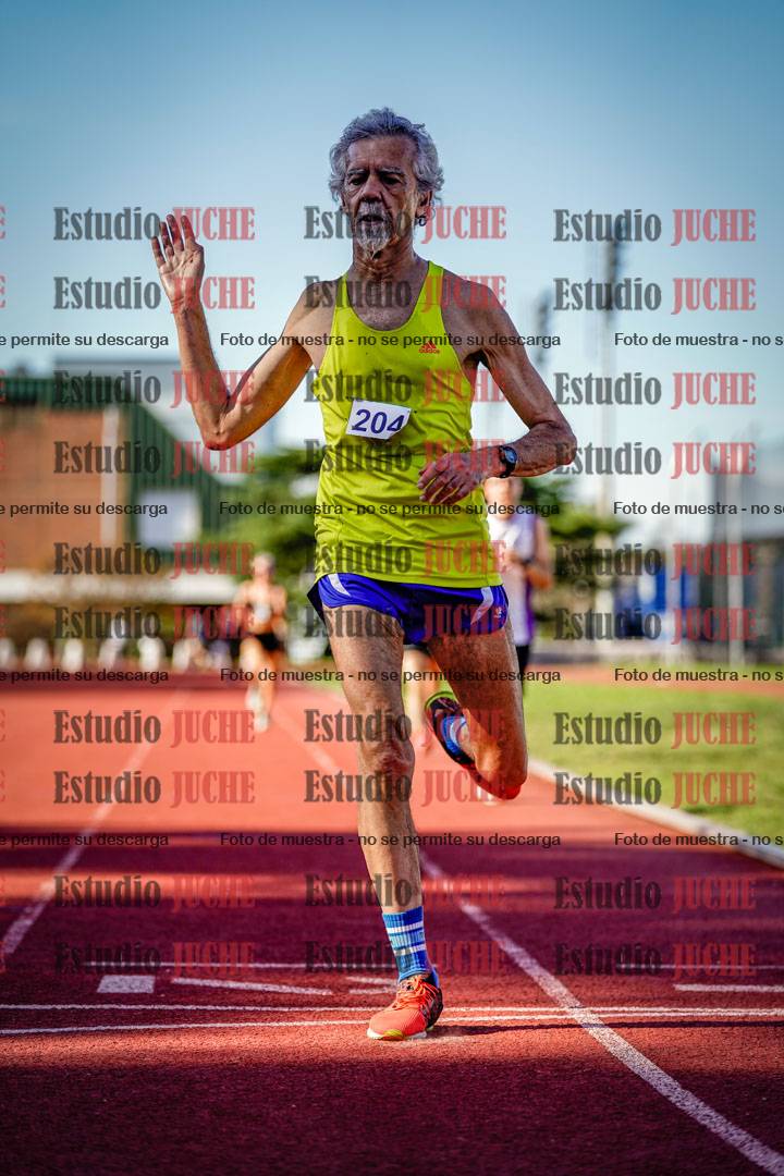 Fotos de los 5000 m llanos de mujeres y varones