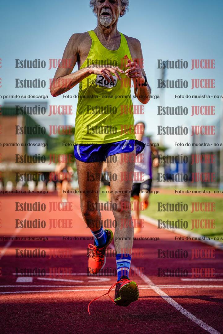 Fotos de los 5000 m llanos de mujeres y varones