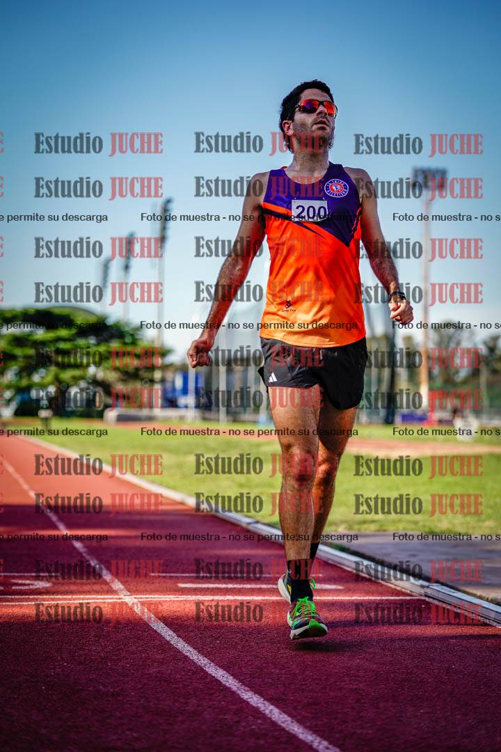 Fotos de los 5000 m llanos de mujeres y varones