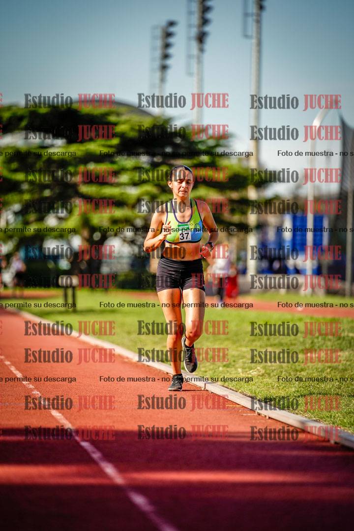 Fotos de los 5000 m llanos de mujeres y varones