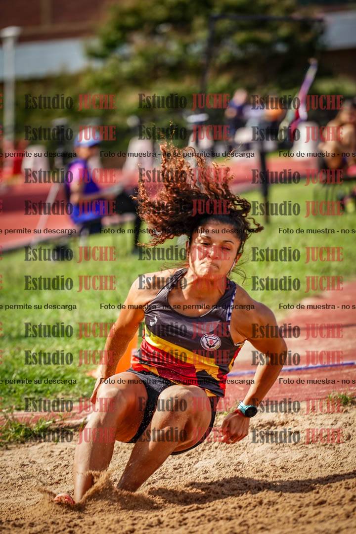 Fotos del salto en largo de mujeres