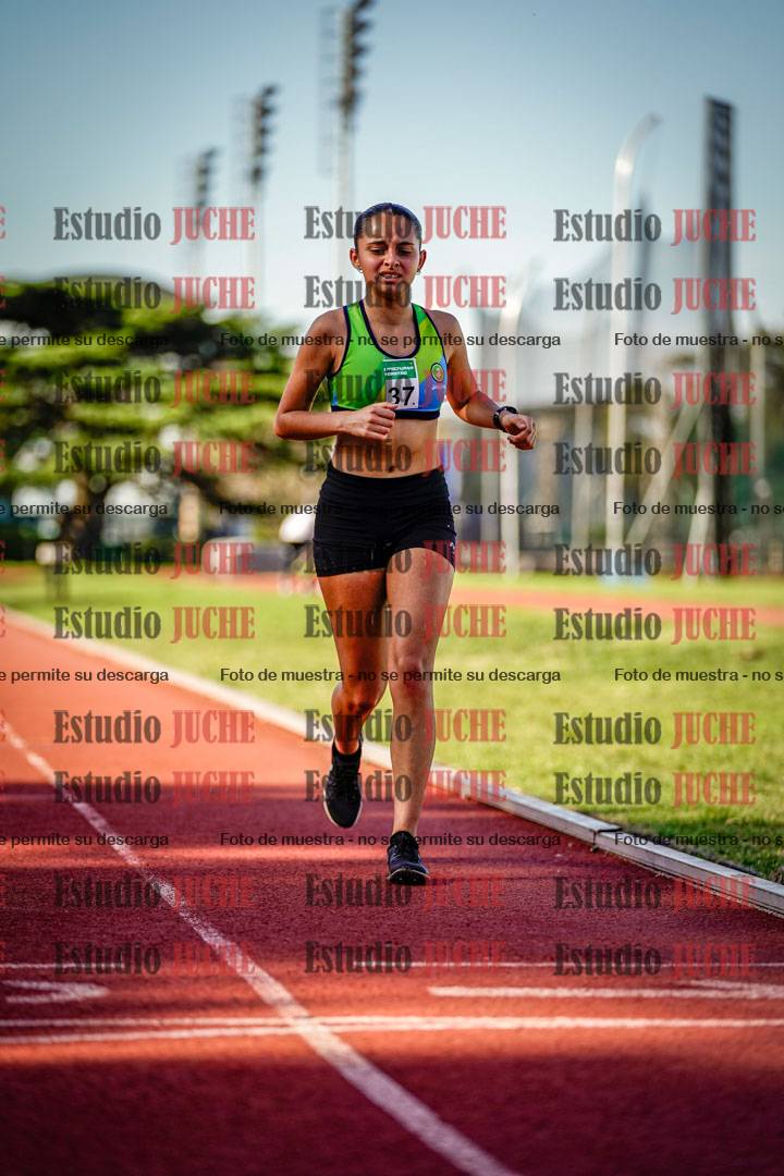 Fotos de los 5000 m llanos de mujeres y varones