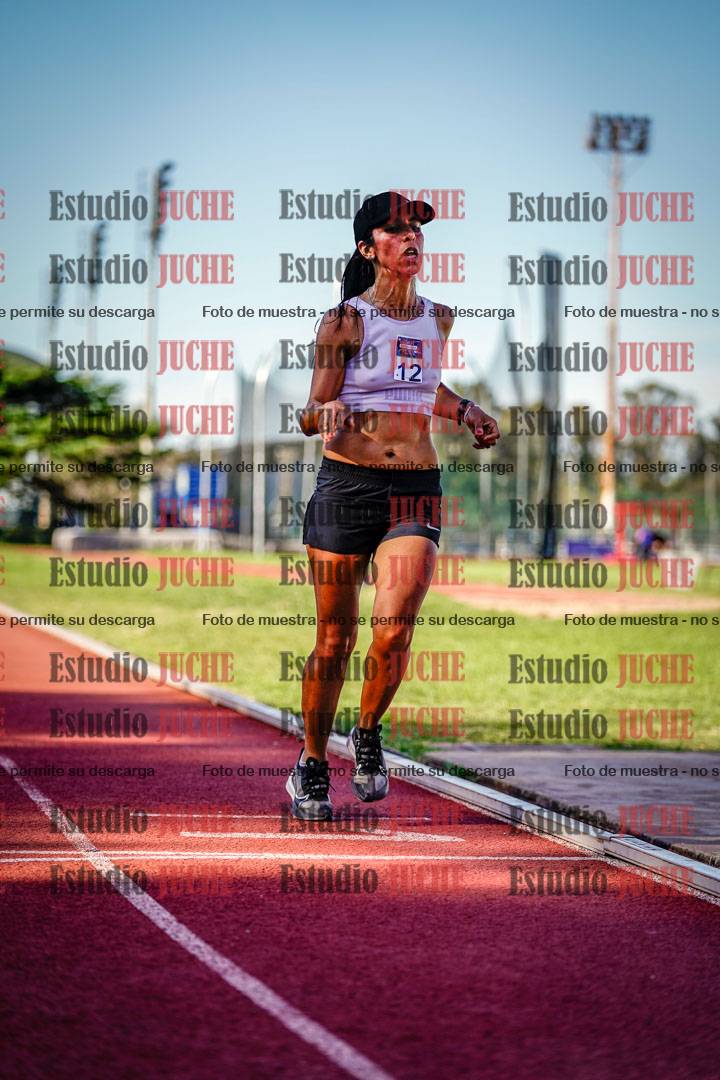Fotos de los 5000 m llanos de mujeres y varones