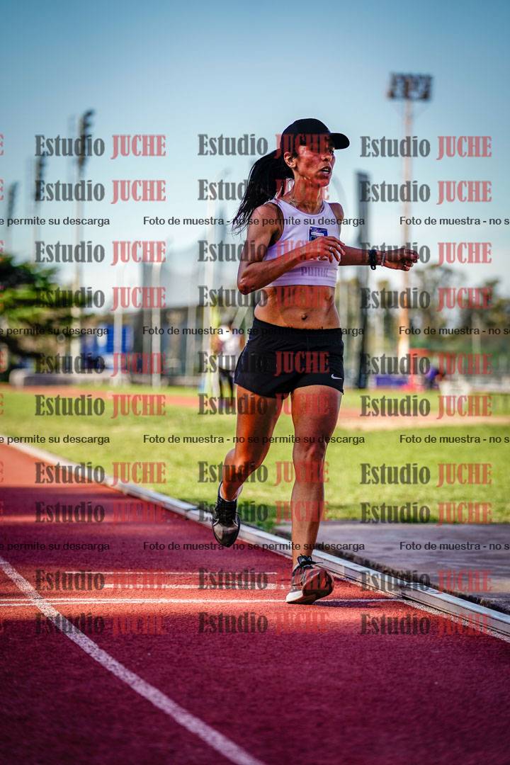 Fotos de los 5000 m llanos de mujeres y varones