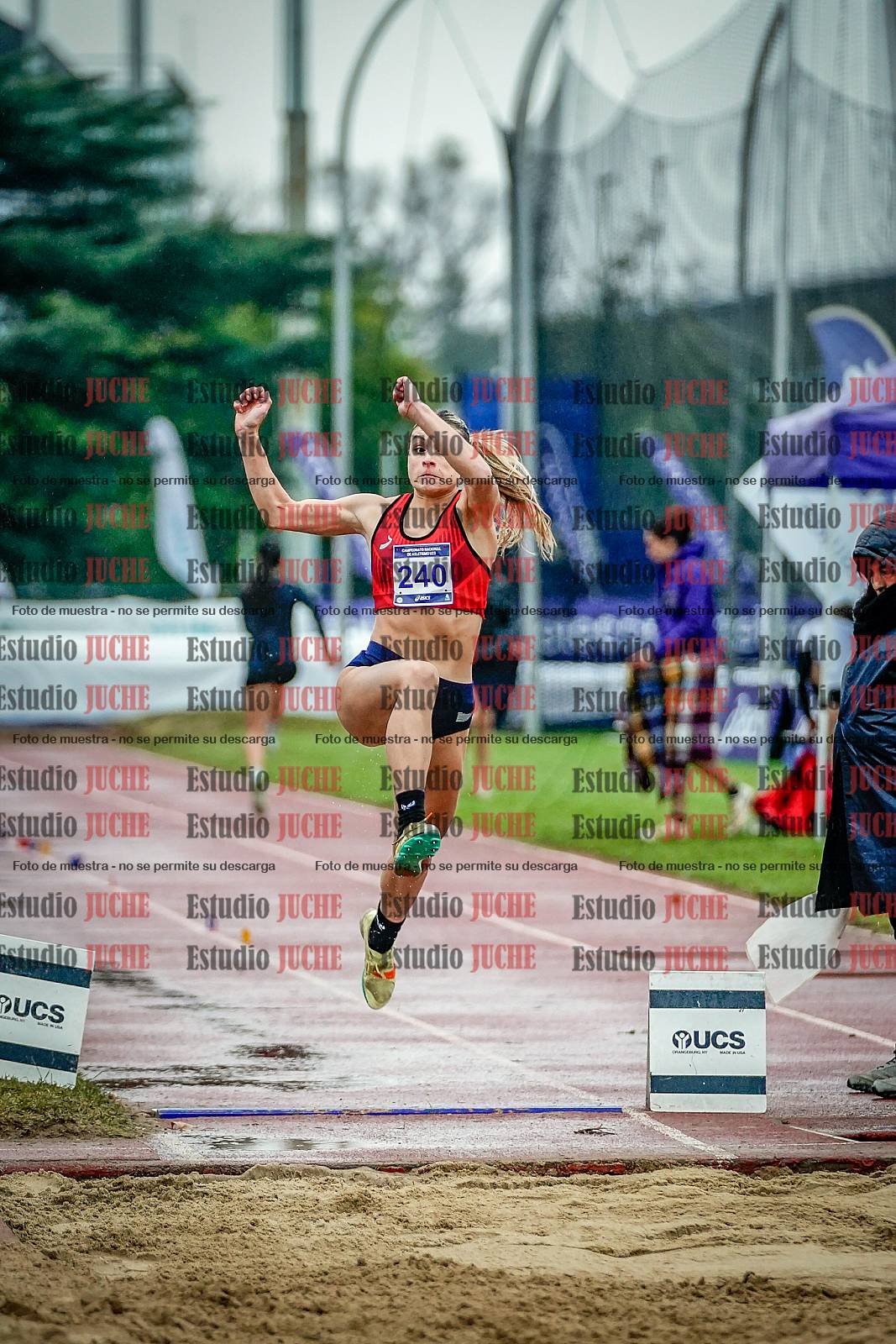 Fotos del salto en largo de mujeres