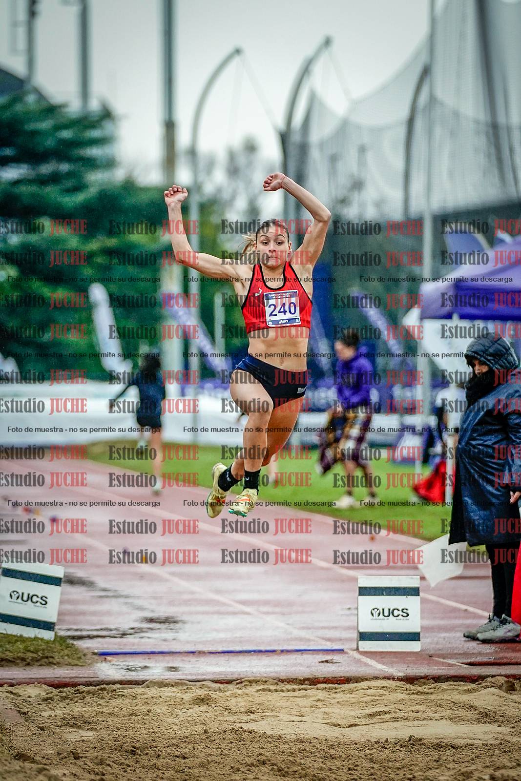 Fotos del salto en largo de mujeres