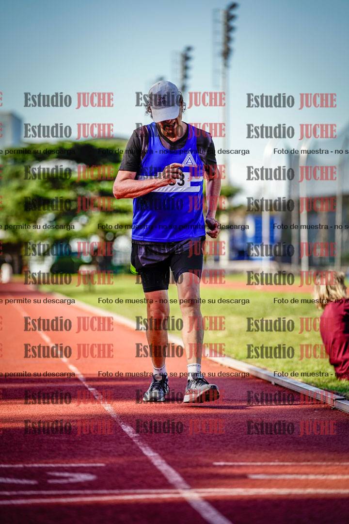 Fotos de los 5000 m llanos de mujeres y varones
