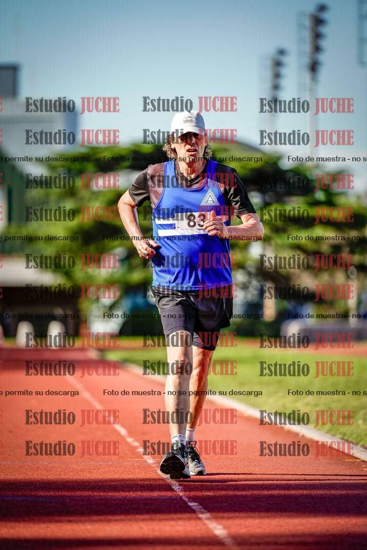 Fotos de los 5000 m llanos de mujeres y varones