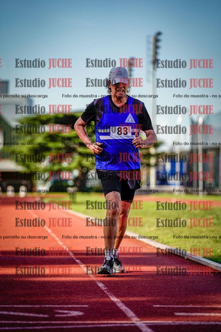 Fotos de los 5000 m llanos de mujeres y varones