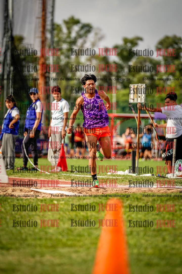 Fotos del salto triple de mujeres y varones