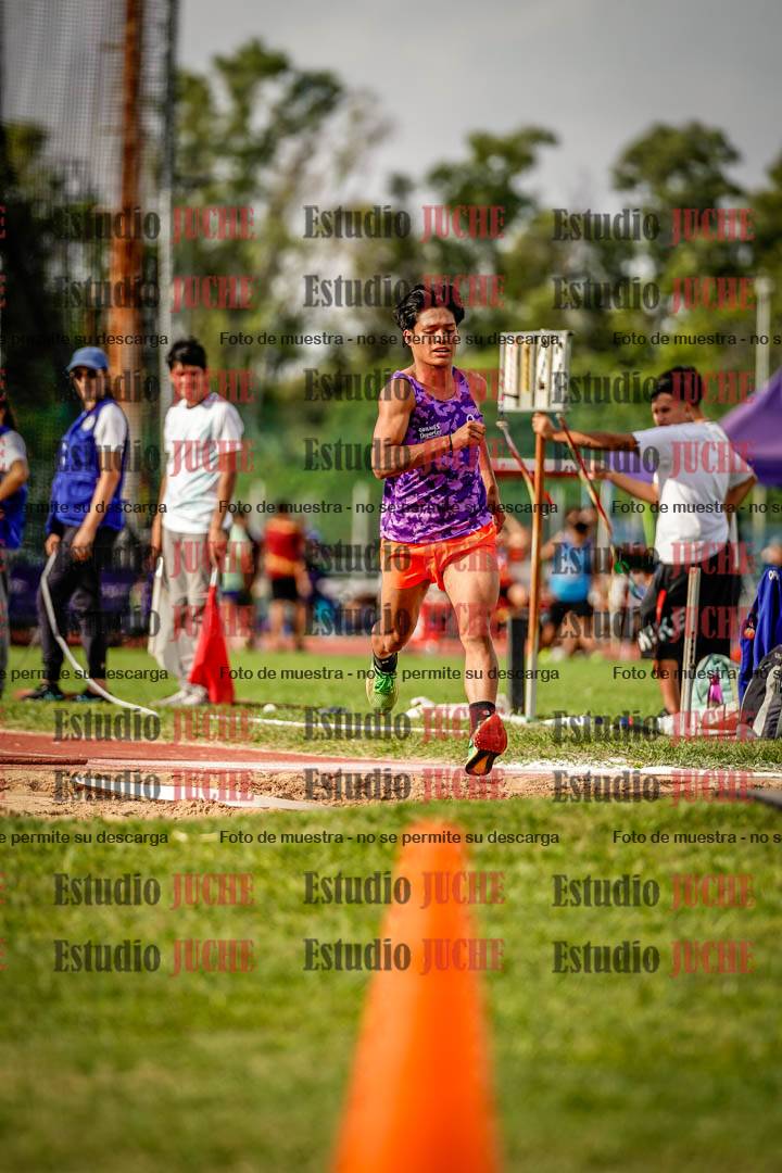 Fotos del salto triple de mujeres y varones