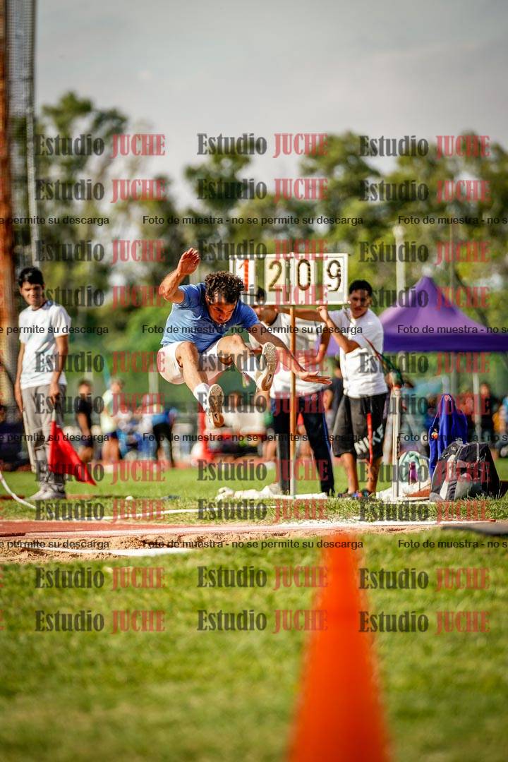 Fotos del salto triple de mujeres y varones