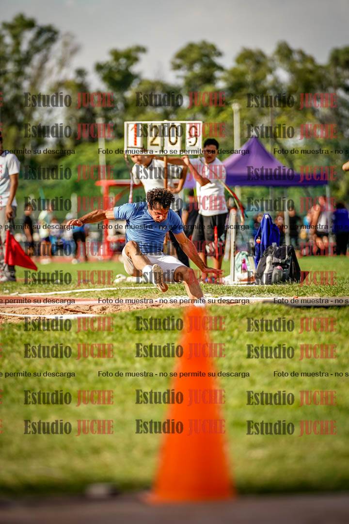 Fotos del salto triple de mujeres y varones