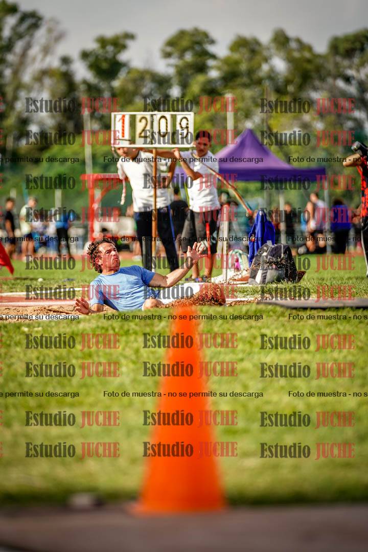 Fotos del salto triple de mujeres y varones