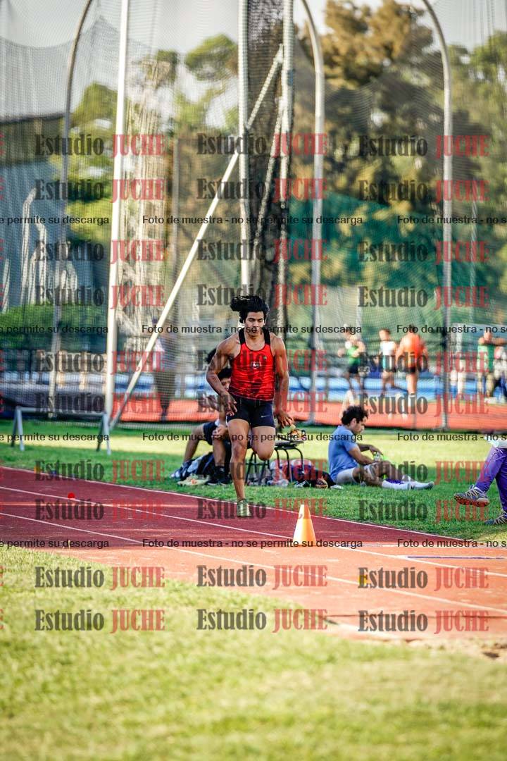 Fotos del salto triple de mujeres y varones