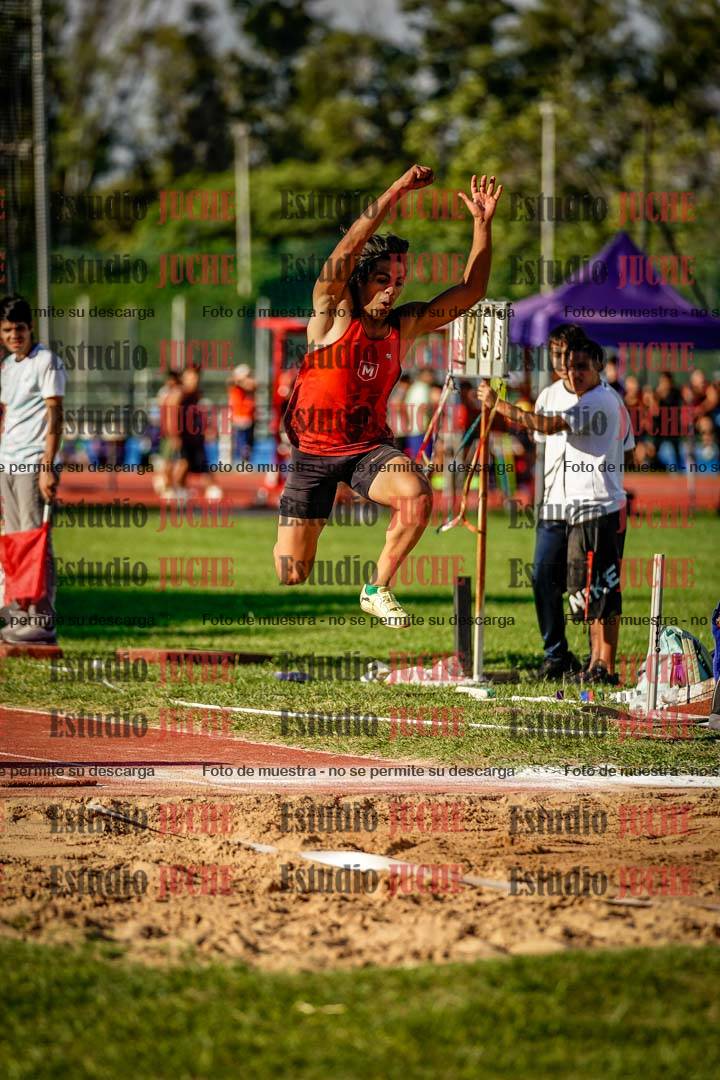 Fotos del salto triple de mujeres y varones